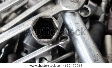 Mechanic at work with tools.