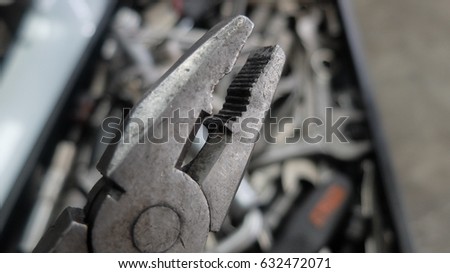 Mechanic at work with tools.