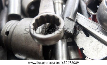 Mechanic at work with tools.