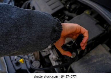 Mechanic Working On A Car Close-up. Open Hood At Service Station Close-up. Car Open Bonnet Top View