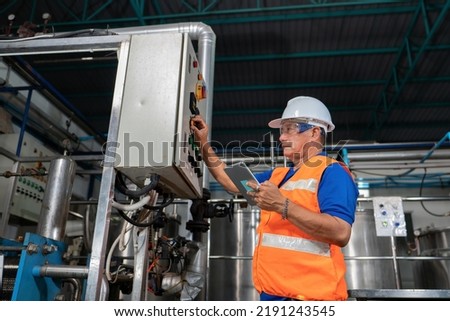 Mechanical aintenance engineer operate shut off valve control boiler at the pressure tank during plant inoperation outage shutdown 
