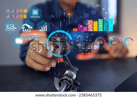 Mechanical engineer holding used piston camshaft and analyze their kinematic to database and knowledge benefit future research development in combustion engine