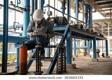 Mechanical Engineer Performing Filter Cartridge Inspection at Industrial Water Treatment Plant