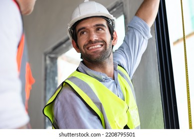 Mechanical Engineer Team Working On Construction Home Building Site