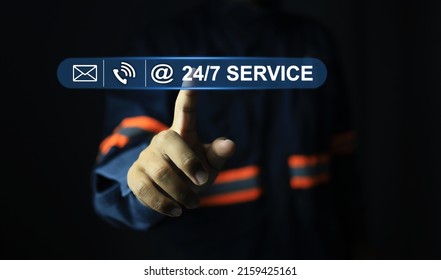 Mechanical engineer or technician pointing the service icon for standby 24 hour and 7 day to support all time customer call email contact in any chanel any time.