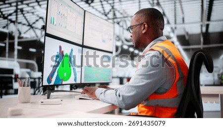 Mechanical Engineer Uses CAD Software To Design Product On Monitor.