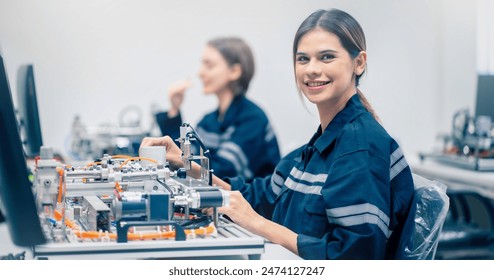 Mechanical engineering team working in robotic technology lap for research and develop for manufacturing automation and robotics.