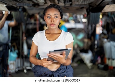 Mechanical Girl Wearing Half Overall Cover Suit Stand Smart Happy Smiling At Car Repair  Garage Shop 
