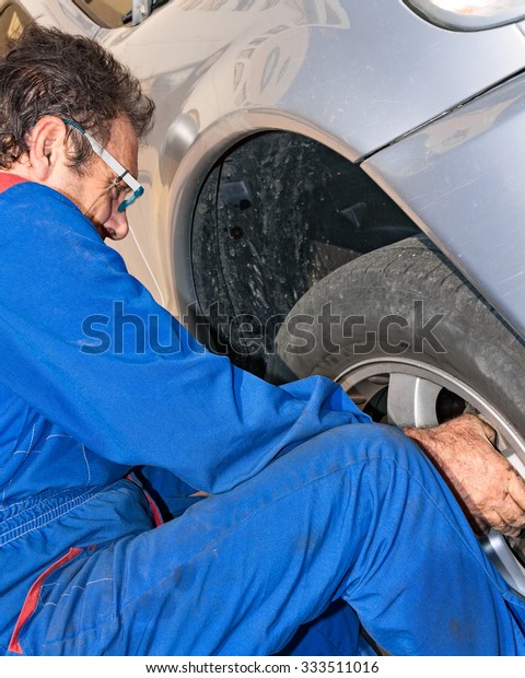 mechanical repairs tire of a car\

