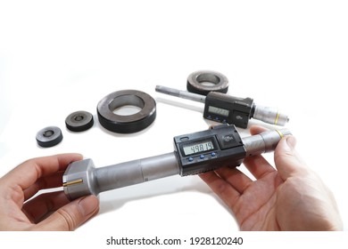 Mechanical Three-Point Internal Micrometer with Setting Ring on a white background,Digital hole micrometer
