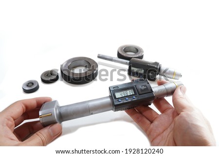 Mechanical Three-Point Internal Micrometer with Setting Ring on a white background,Digital hole micrometer
