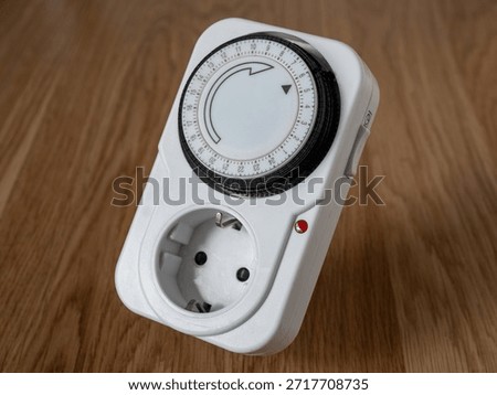 Mechanical timer relay. 24-hour programmable timer for precise device control. Ideal for automating home appliances and lightin 