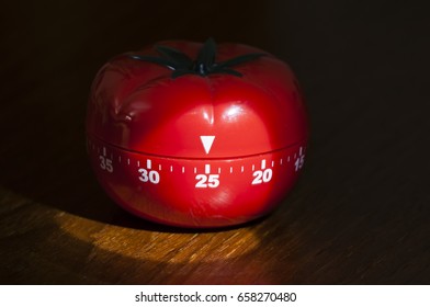 Mechanical Tomato shaped kitchen timer for cooking, studying and working.