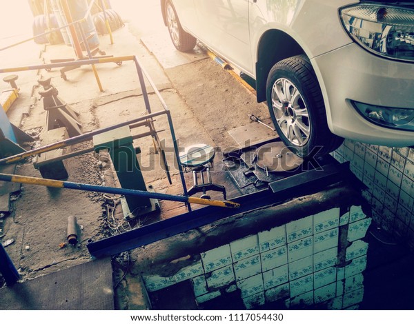 Mechanical tools for auto service and car repair in\
Car repair shop