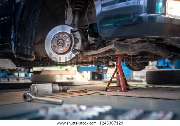 Mechanical tools for auto service and car repair in\
Car repair shop