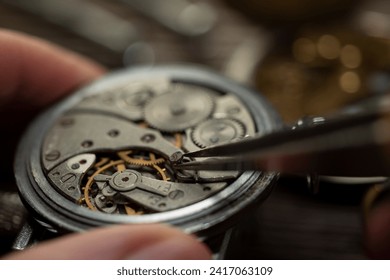 Mechanical watch repair, watchmaker's workshop - Powered by Shutterstock