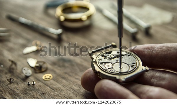 Mechanical watch repair, watchmaker\'s workshop,\
special tools