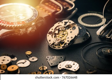 mechanical watch repairing concept. closeup the parts of mechanical wristwatch.