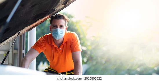 Mechanical Wearing Face Mask Protec Covid Virus. Mechanic Working In A Car Service Station