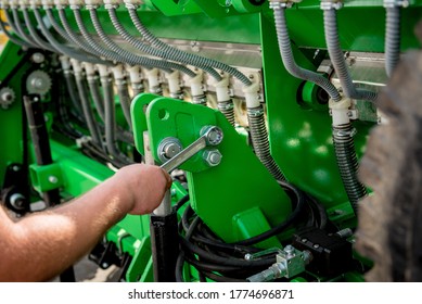 The mechanics repair combine harvester. Modern agricultural machinery - Shutterstock ID 1774696871