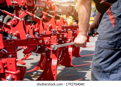 The Mechanics Repair Combine Harvester. Modern Agricultural Machinery