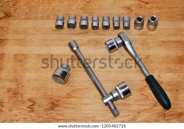 Mechanics\
Tool Set and Isolated on White Background. Mechanics Tool Kit. A\
set of wrenches and car keys-heads.\
Building