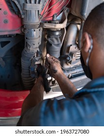 Mechanics Working On Truck Maintenance In Brazil