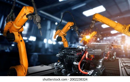 Mechanized industry robot arm for assembly in factory production line . Concept of artificial intelligence for industrial revolution and automation manufacturing process .