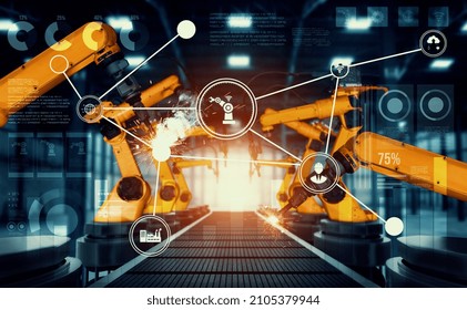 Mechanized Industry Robot Arm For Assembly In Factory Production Line . Concept Of Artificial Intelligence For Industrial Revolution And Automation Manufacturing Process .