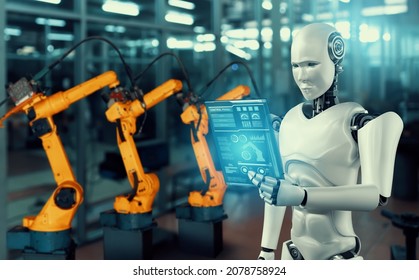 Mechanized Industry Robot And Robotic Arms For Assembly In Factory Production . Concept Of Artificial Intelligence For Industrial Revolution And Automation Manufacturing Process .