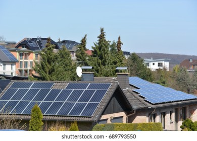 Mechernich, Germany - March 26, 2017 - Solar panels on roofs in german town - Shutterstock ID 689793550