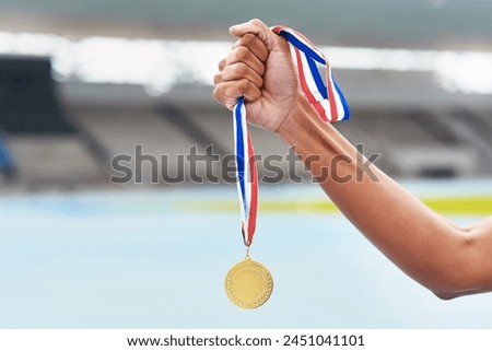 Medal, winner and athlete at outdoor stadium podium for competition success, achievement or motivation. Champion, gold award and celebration of running contest for fitness, health and wellness