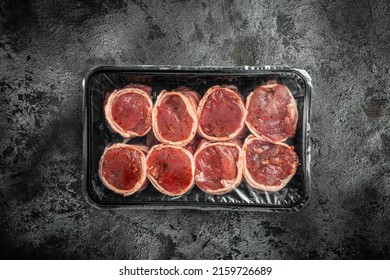 medallion steaks wrapped in bacon, Raw fresh marbled meat Steak filet mignon. Culinary, cooking concept. top view. place for text.