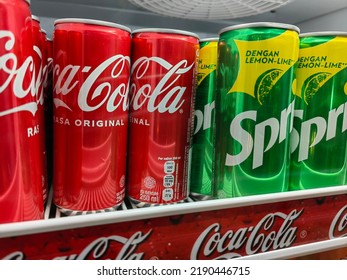 Medan, Indonesia - August 16, 2022: Soft Drinks Called Coca Cola And Sprite Are On Inside The Fridge. Flat Lay. Background Usage.