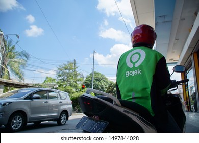 Medan, Indonesia - Ca 2019: Logo And New Uniform Of The Online Motorcycle Taxi Company Gojek In The City Of Medan.