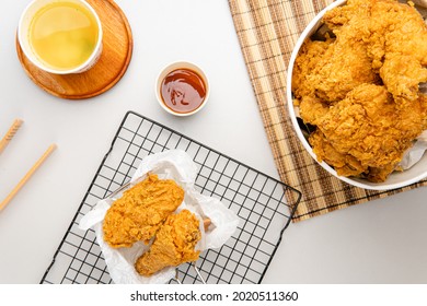 Medan, Indonesia -  Mei 28 2020.  A lots of fried chicken hot wings in bucket of KFC