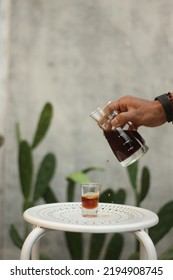 Medan May 2021 - A V-60 Coffee That Is Poured Into A Small Glass To See The Splash Of Bulk Water