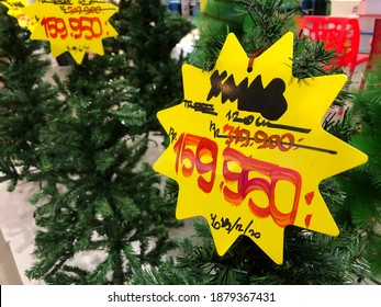 Medan, North Sumatra-December 2020: The display of Christmas tree with discount price a mall in Medan. End year sale is expected to boost the growth of economy during the pandemic.