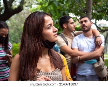 Medellin, Antioquia, Colombia - February 19 2022: Young South American Woman Is Listening Attentively At The Meeting In The Street