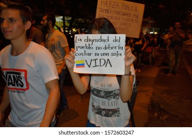 Medellin, Antioquia, Colombia, November 26, 2019. Young People Show Posters Alluding To The Protest Over The Death Of Dylan Cruz.