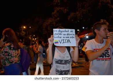 Medellin, Antioquia, Colombia, November 26, 2019. Young People Show Posters Alluding To The Protest Over The Death Of Dylan Cruz.