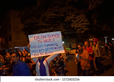 Medellin, Antioquia, Colombia, November 26, 2019. Young People Show Posters Alluding To The Protest Over The Death Of Dylan Cruz.