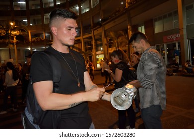 Medellin, Antioquia, Colombia, November 26, 2019. Young People Show Posters Alluding To The Protest Over The Death Of Dylan Cruz.