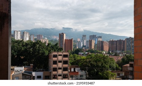 Medellin Cityscape At Day Time Against Green Mountains