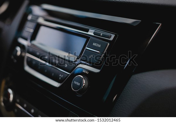 Media\
button in car audio system. Phone icon in\
auto.