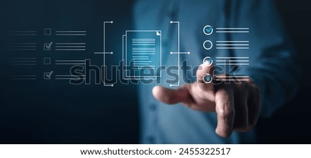 media, data, security, sheet, file, text, symbol, document, enterprise, management. A man is pointing at a screen with a document virtual screen. Concept of importance and scrutiny.