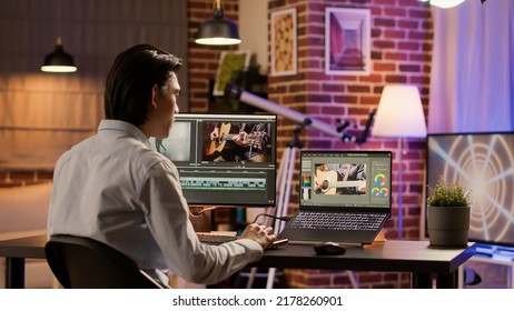 Media freelancer using film production software on computer to edit video content on app. Designing and editing with visual effects and color gradient to create movie. . - Shutterstock ID 2178260901