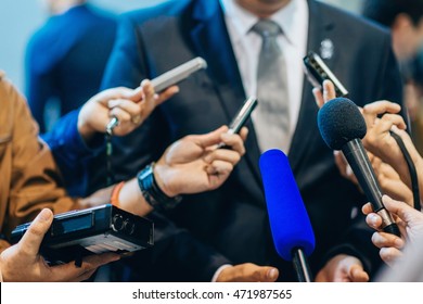 Media interview with businessman - Shutterstock ID 471987565