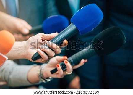 Media interview microphones after a press conference.