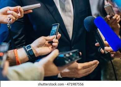 Media interview with politician or business person.